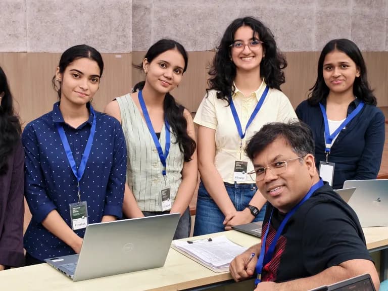 Judges reviewing submitted campus hackathon projects