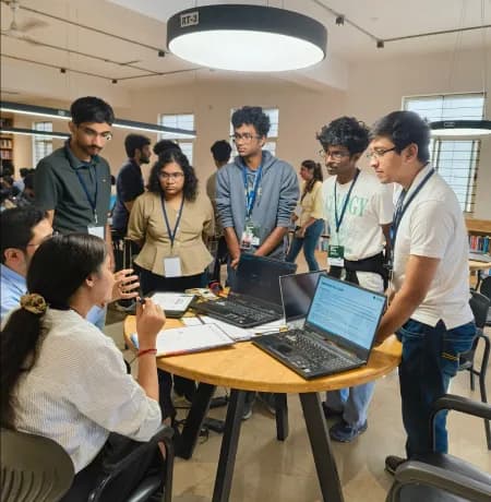Reviewers evaluating hackathon projects against criteria