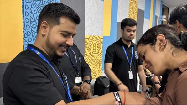 Developers being onboarded into a hiring challenge